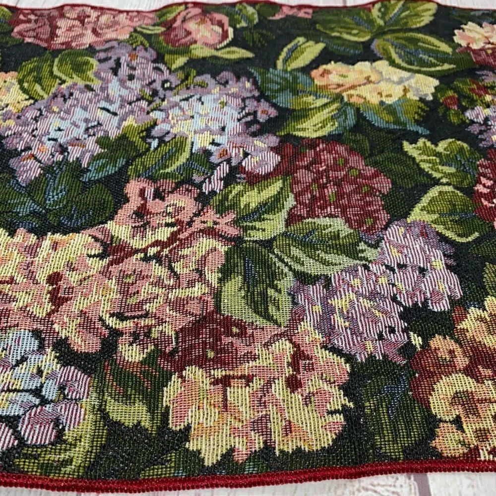 Floral print table runner with fringe ends approx  52”x12.5”